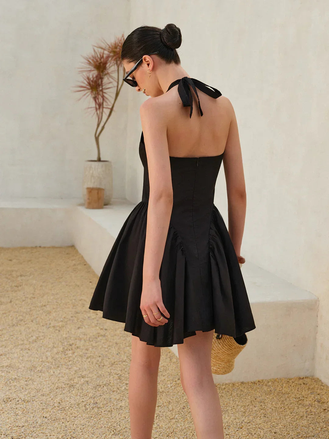 Timeless Noir Bow Tie Pleated Halter Dress - LA FEMME WANDERER