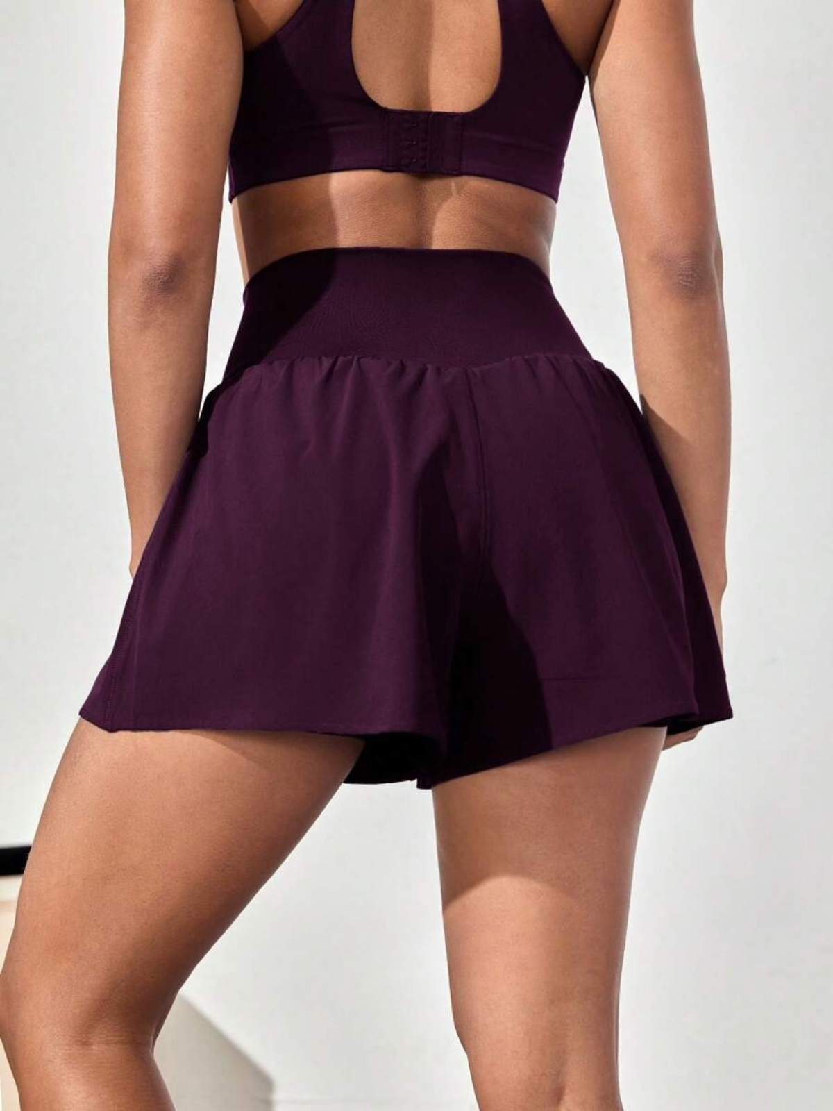 Short de course anti-transpiration, taille mi-haute, poches, séchage rapide