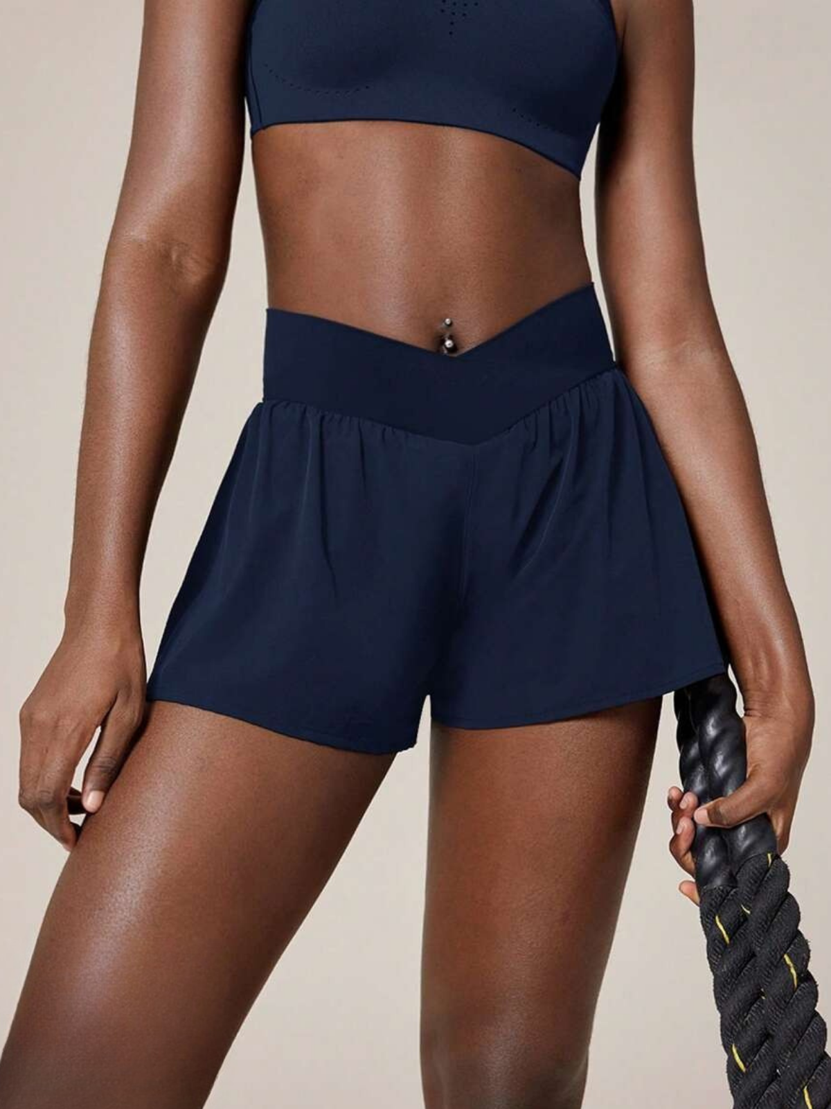 Short de course anti-transpiration, taille mi-haute, poches, séchage rapide