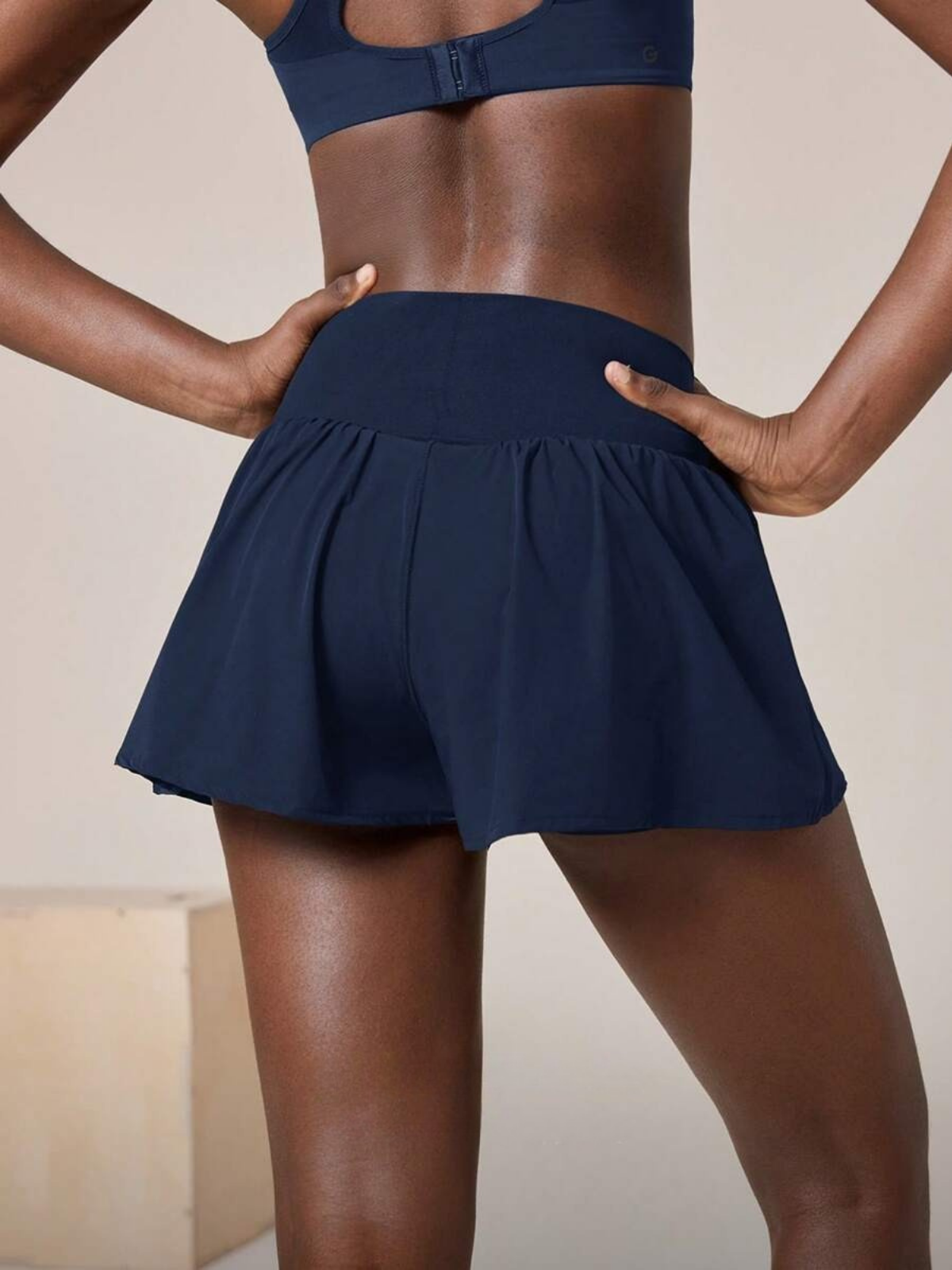 Short de course anti-transpiration, taille mi-haute, poches, séchage rapide