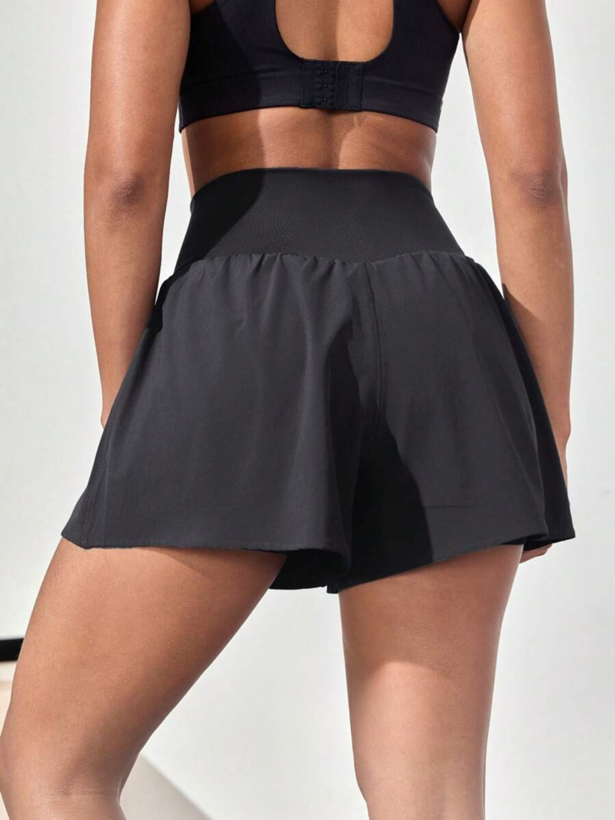 Short de course anti-transpiration, taille mi-haute, poches, séchage rapide