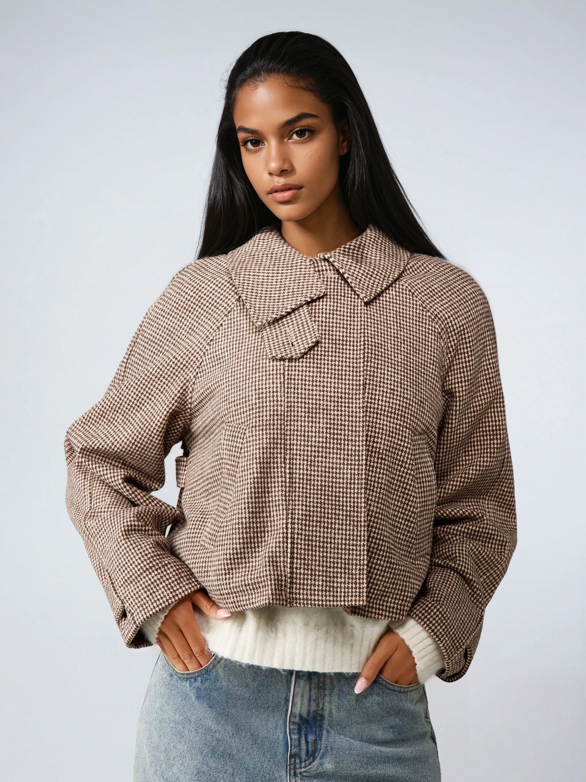 Veste matelassée pied-de-poule à col montant, coupe oversize, idéale par temps froid.