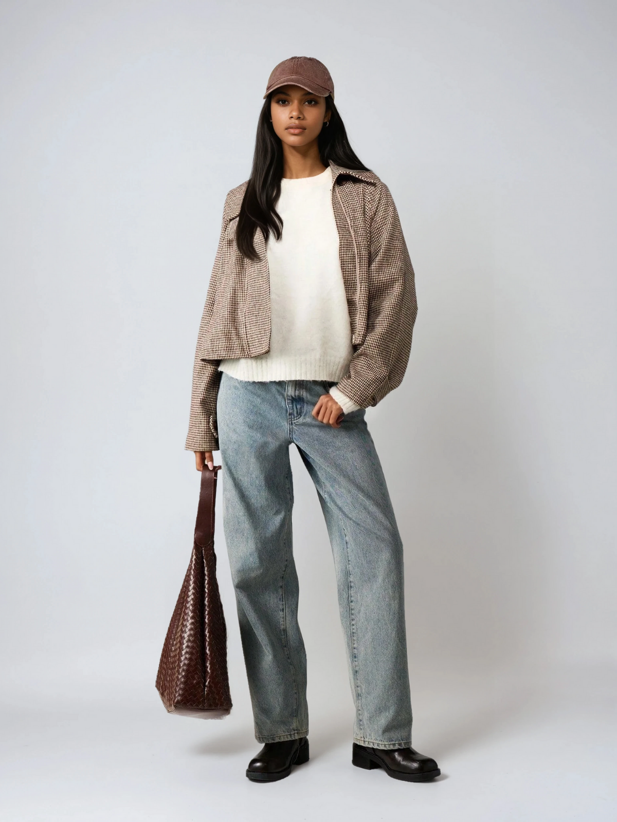 Veste matelassée pied-de-poule à col montant, coupe oversize, idéale par temps froid.