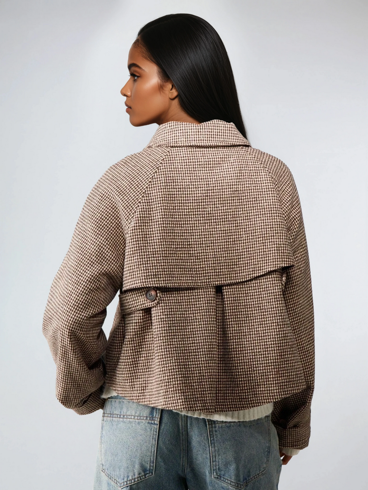 Veste matelassée pied-de-poule à col montant, coupe oversize, idéale par temps froid.